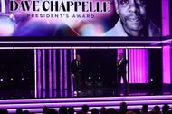 Honoree Dave Chappelle accepts the NAACP President's Award from Derrick Johnson, President and CEO, NAACP, onstage during the 56th NAACP Image Awards at Pasadena Civic Auditorium on February 22, 2025 in Pasadena, California. (Photo by Johnny Nunez/Getty Images for BET)